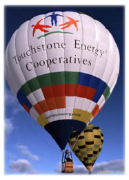 The 69,000 cubic-foot Touchstone Energy hot air balloon measures 72 feet tall and 53 feet wide when fully inflated and is a professionally flown and managed, competitive balloon operated by Cooperative Balloon Associates, LLC. Touchstone Energy is a nationwide alliance of more than 560 consumer-owned, locally-operated utilities, such as WFEC, that provide high quality, affordable service to customers and their communities.