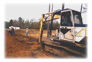 Underground line work: WFEC linemen install underground service to the Martins Woods subdivision in Chipley.